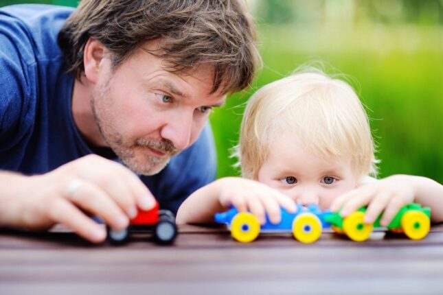 Father and Son Playing