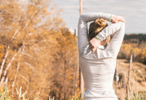 Woman stretching before exercising